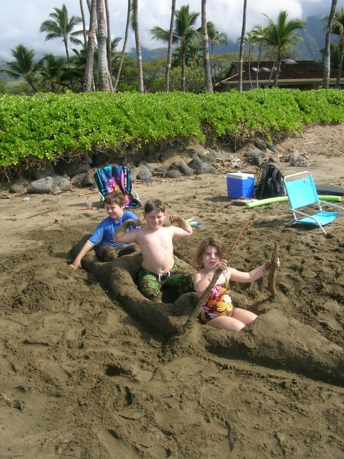Playing at the beach in Hawaii is a great way to engage a family with children who are young.